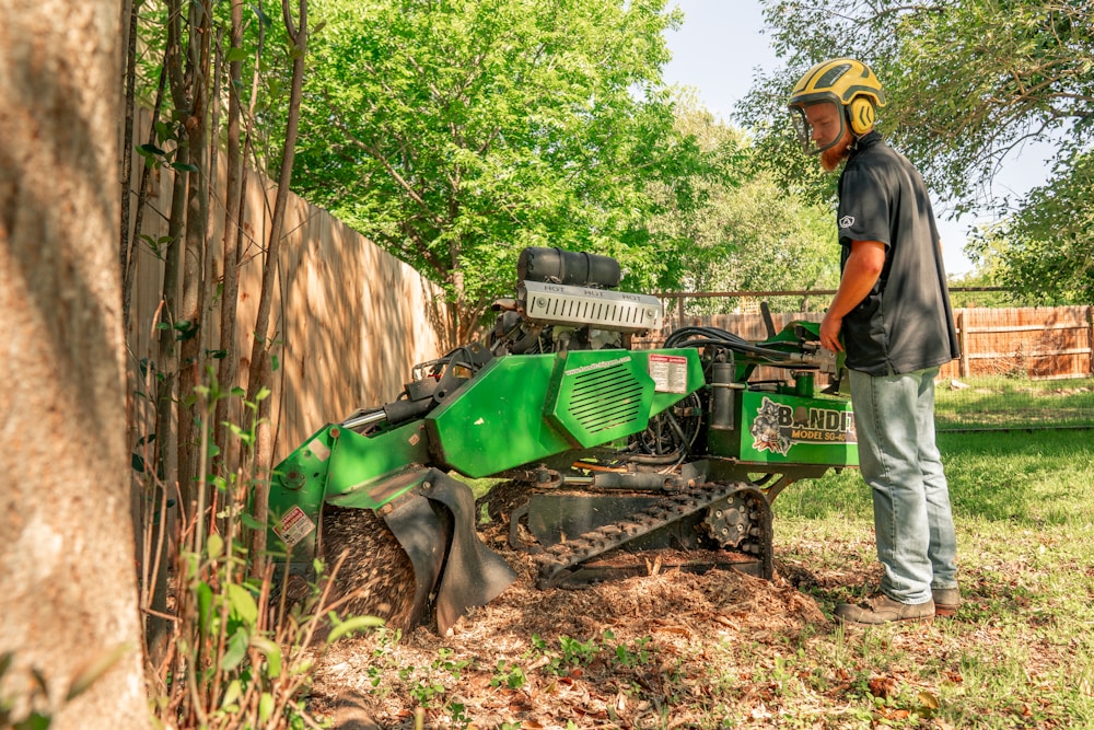Stump grinder cutting a stump below grade